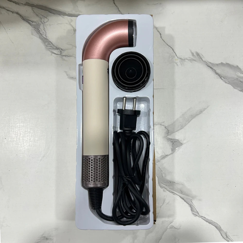 Rose gold and cream 5-in-1 ionic hair dryer with diffuser attachment in professional salon-style packaging.