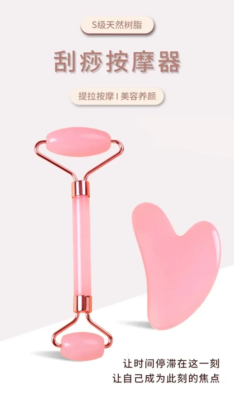 Pink resin facial roller and heart-shaped Gua Sha scraper set for skin lifting, anti-wrinkle, and face massage.