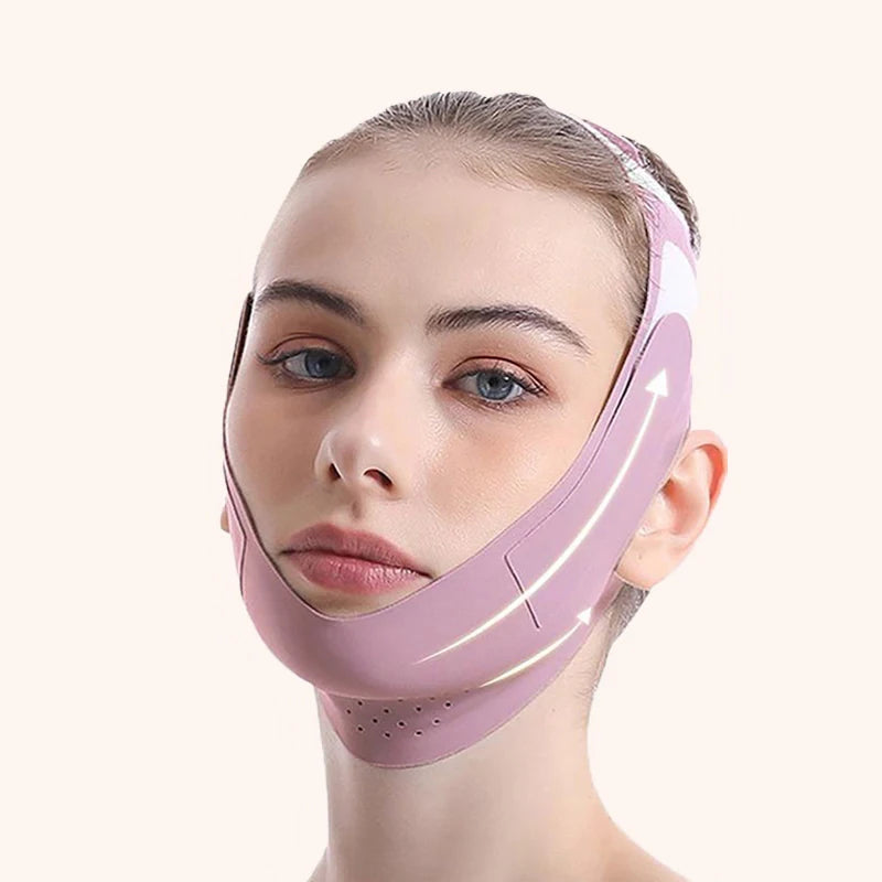 A woman wears a smooth, mauve V-line face slimming bandage strap that secures under the chin and around the head.