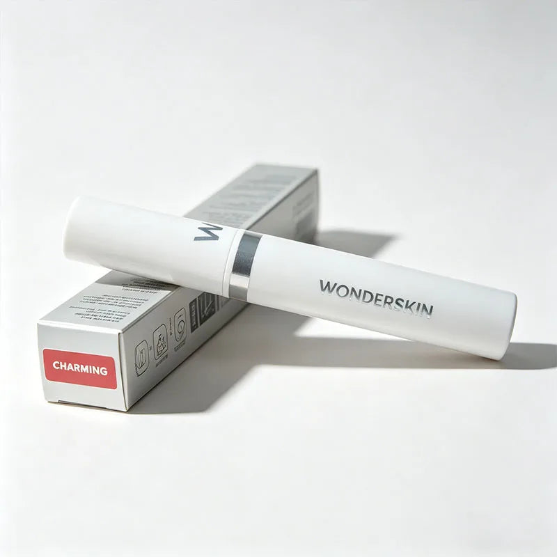 Wonderskin peel-off lip stain in Charming, a long-lasting waterproof pink lip tint in white packaging.