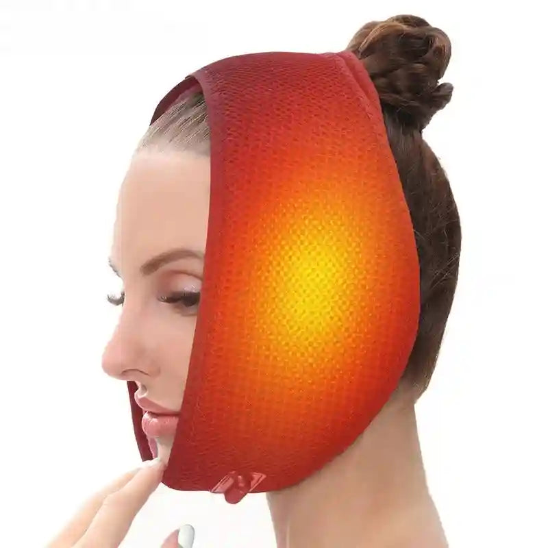 Woman wearing a red mesh electric heated facial wrap over her jaw and chin with a glowing orange heat effect.