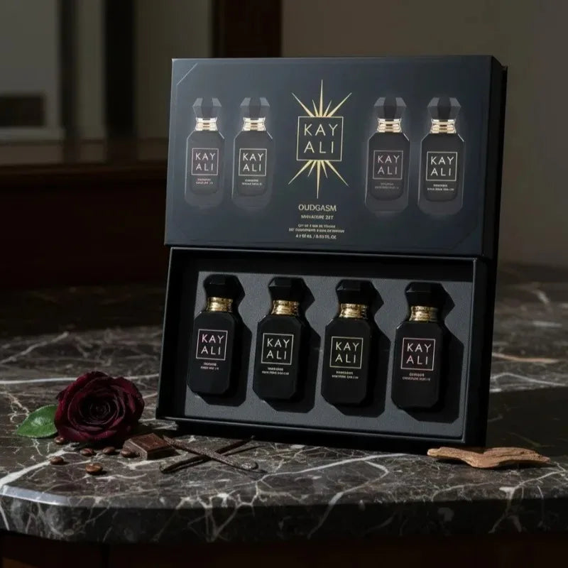 KAYALI Oudgasm gift set: 4x10ml mini black perfume bottles, long-lasting floral musk EDP for women, luxury set.