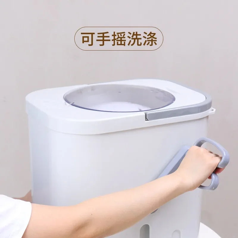 Tidesmit manual laundry and shoe washing machine, featuring a foot-pedal operated drum for small baby clothes, view 4.
