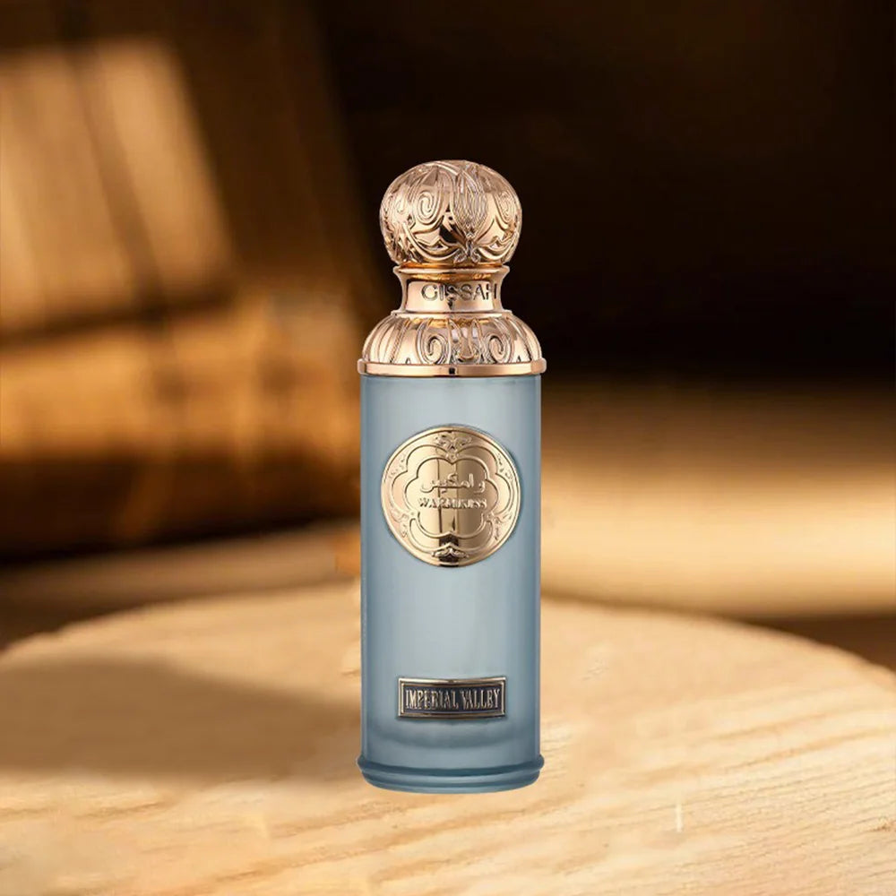 Gissah Imperial Valley Unisex EDP: 100ml luxury Arabian oud perfume in a blue cylinder bottle with ornate gold cap.