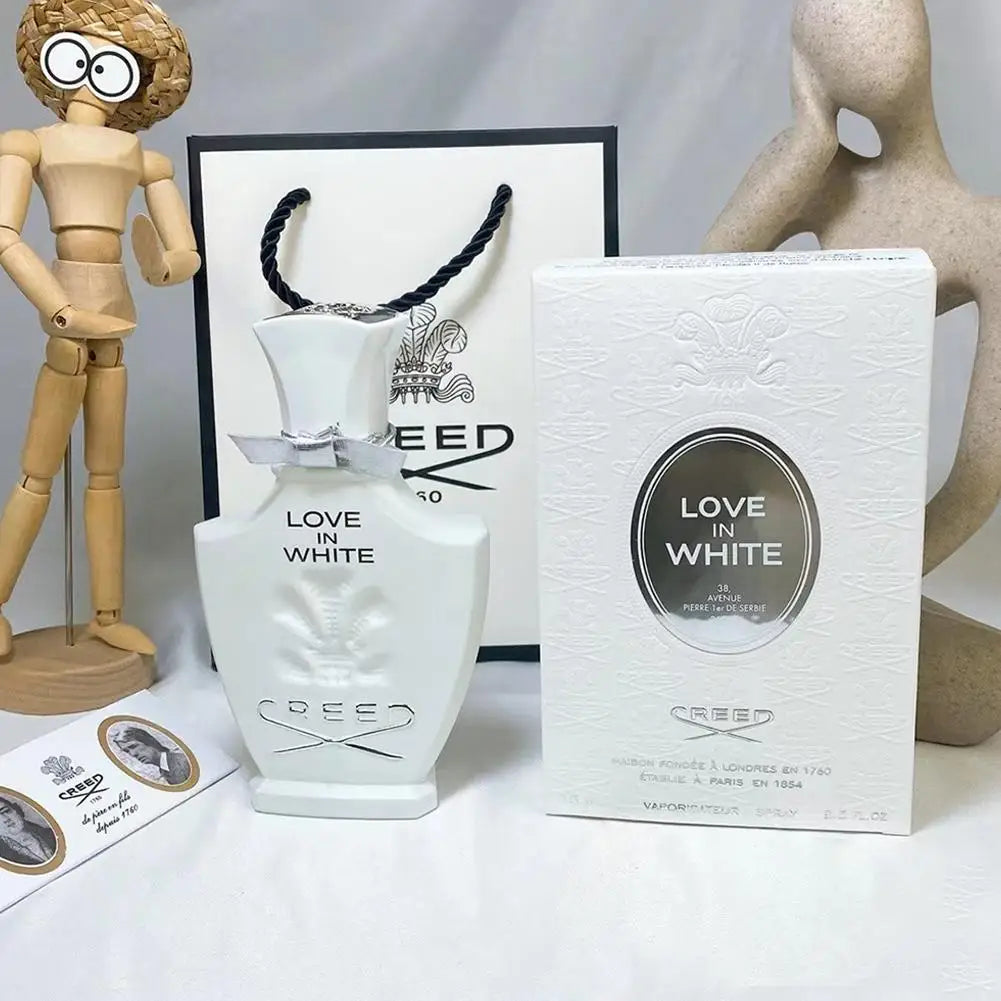 Creed Love in White EDP: Elegant white sculptural bottle of this iconic luxury floral women's fragrance spray.