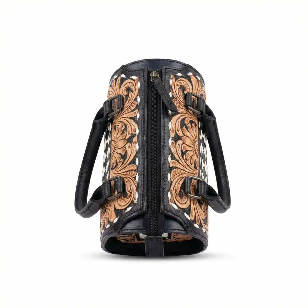 Genuine leather speedy duffle trunk with floral tooling, black and white checkerboard pattern, and top zipper closure.