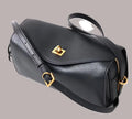 Royaa black genuine leather designer shoulder bag with elegant gold hardware, adjustable strap, and zip closure.