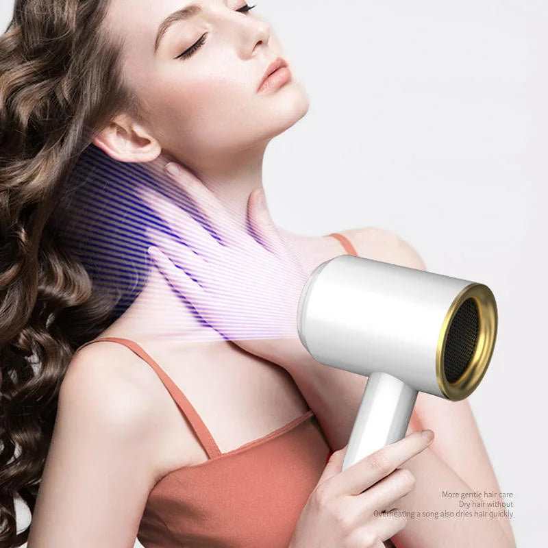 White professional high-speed hair dryer with gold trim, featuring constant temperature technology for gentle styling.