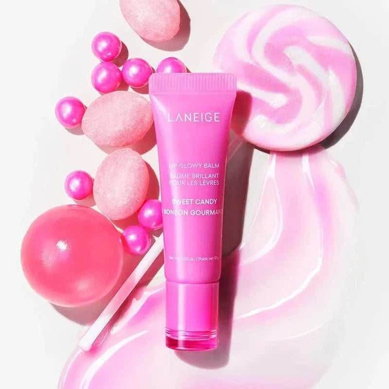 Laneige Lip Glowy Balm in Sweet Candy, a moisturizing pink tinted serum lipstick with a glossy, smooth finish.