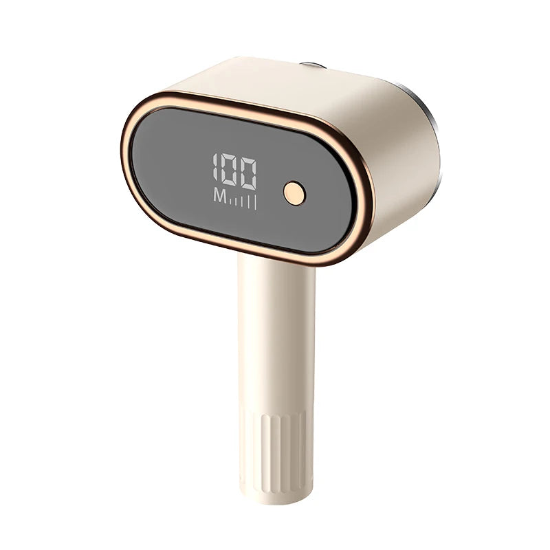 White electric lint remover with warm-gold trim and LED power indicator