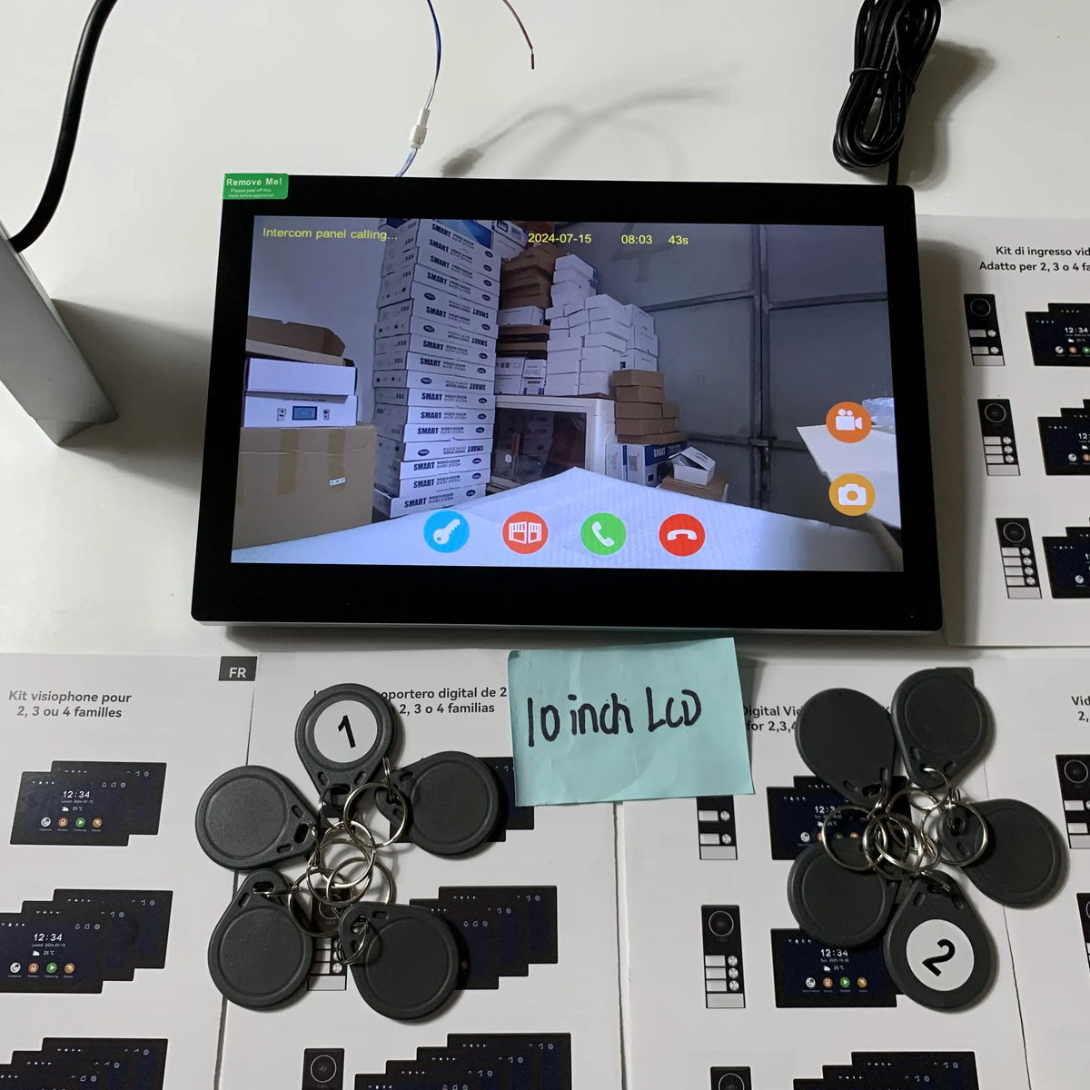 Black video doorbell intercom kit with 10-inch monitor showing live video feed