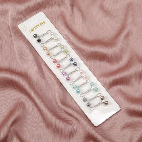 A pack of 12 Tidesmit metal safety hijab pins featuring colorful faux pearl bead ends on a white display card.