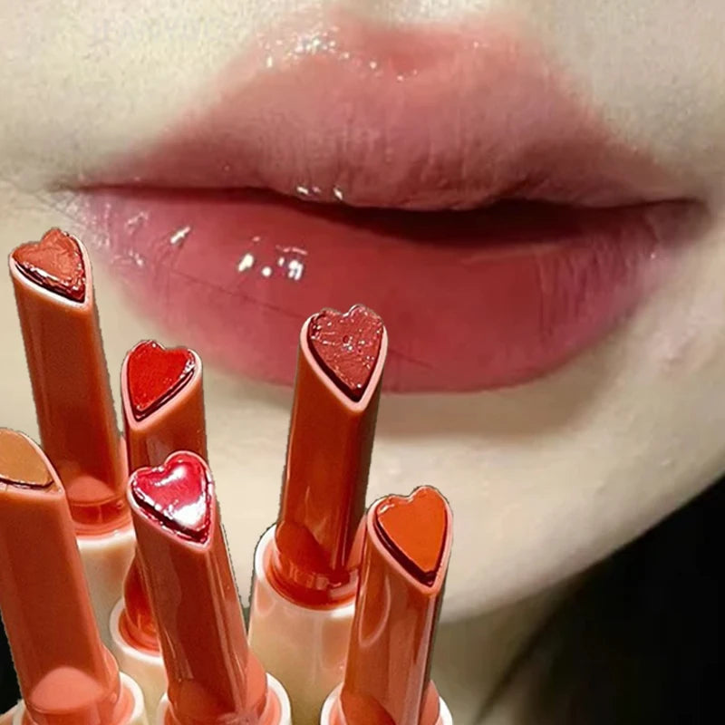 Heart-shaped moisturizing lip glaze pens with a glossy, water-light finish for a mirror-glass jelly lip look.
