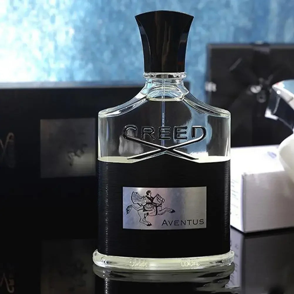 Creed Aventus Eau de Parfum spray for men: iconic black bottle, silver label with rider, luxury unisex fragrance.