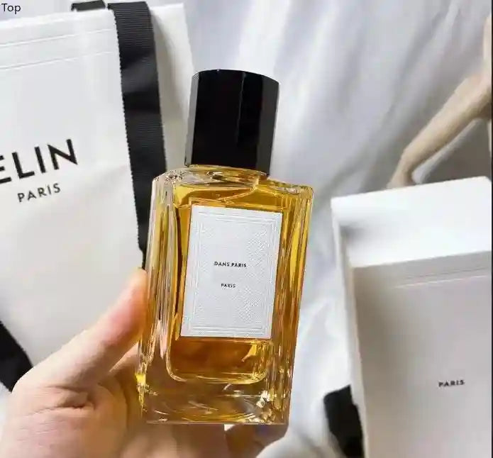 Dans Paris unisex perfume in a rectangular glass bottle with a black cap, long-lasting luxury fragrance for men & women.