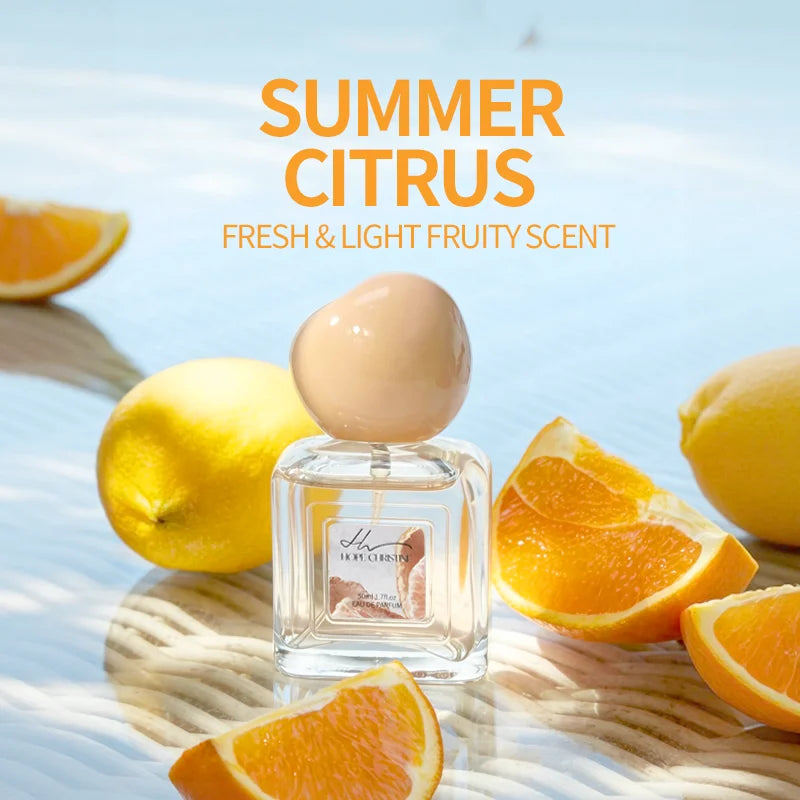Hope Christine EDP: Summer citrus women's perfume. Fresh pomelo & vanilla coconut scent in a square glass bottle.