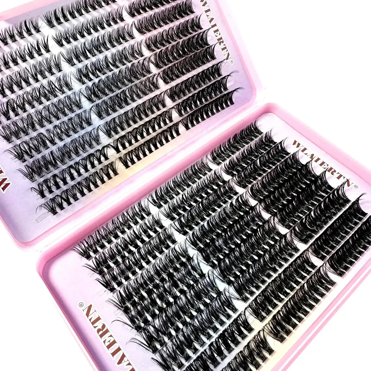Black individual cluster lashes in a pink storage case for professional eyelash extensions.