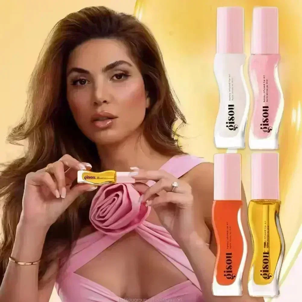 Gisou honey-infused lip oil collection in glossy tubes for moisturizing, hydrating, and smoothing lip lines.