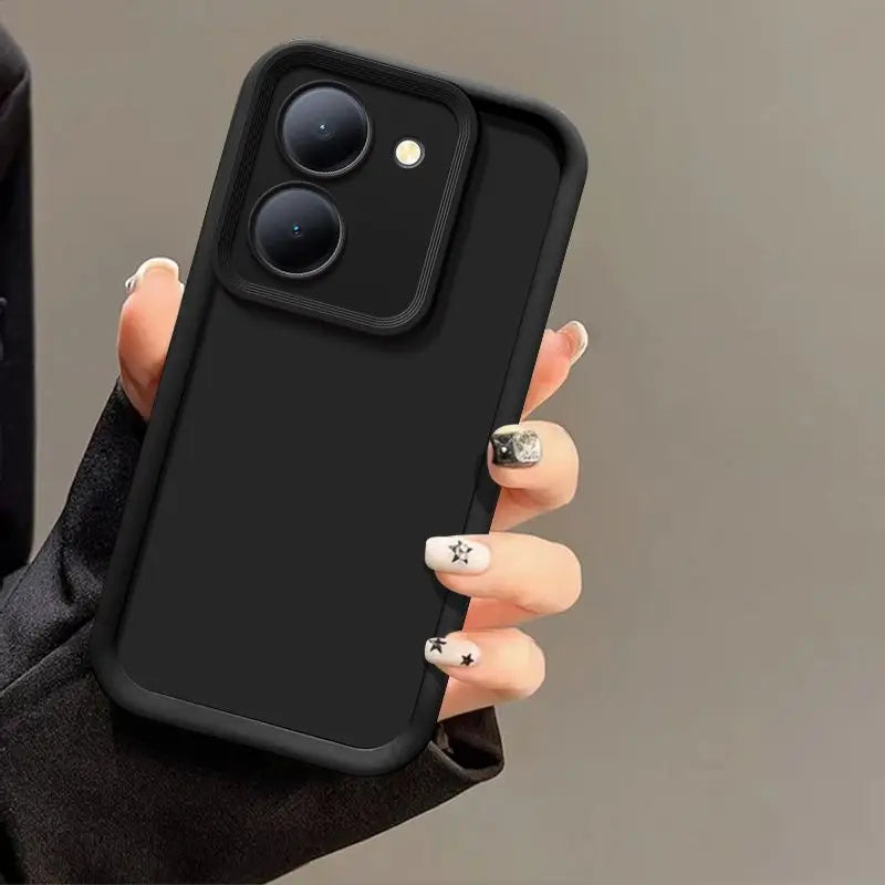 Hand holding a matte black Tidesmit protective case for Xiaomi Poco M7 Pro with a raised square camera frame.