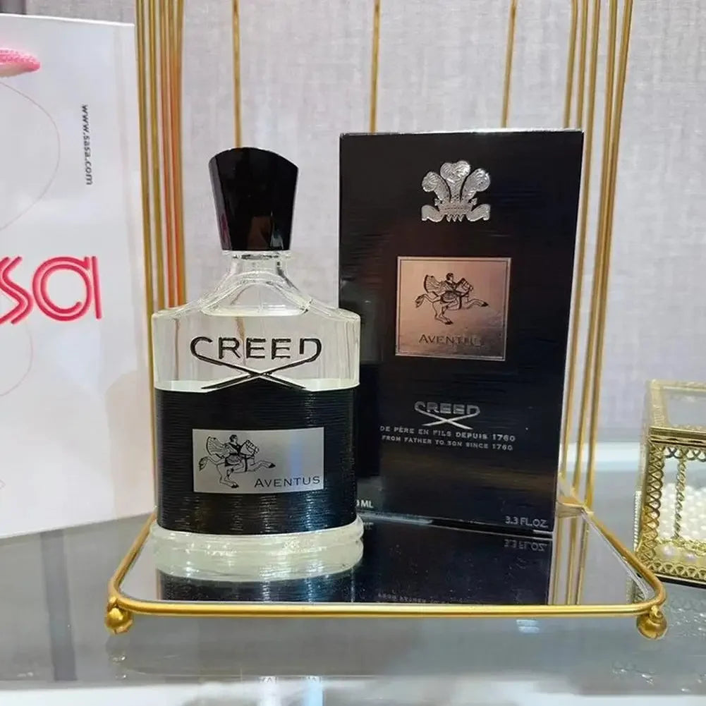 Creed Aventus Eau de Parfum spray: iconic glass bottle, black label, luxury unisex fragrance in signature box.