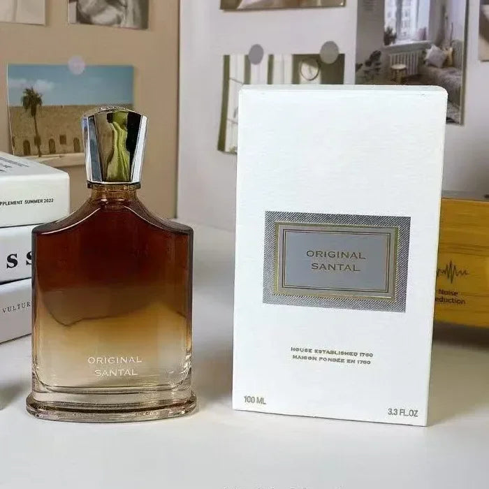 Original Santal 100ml fragrance bottle with a metallic cap and a matching white box.
