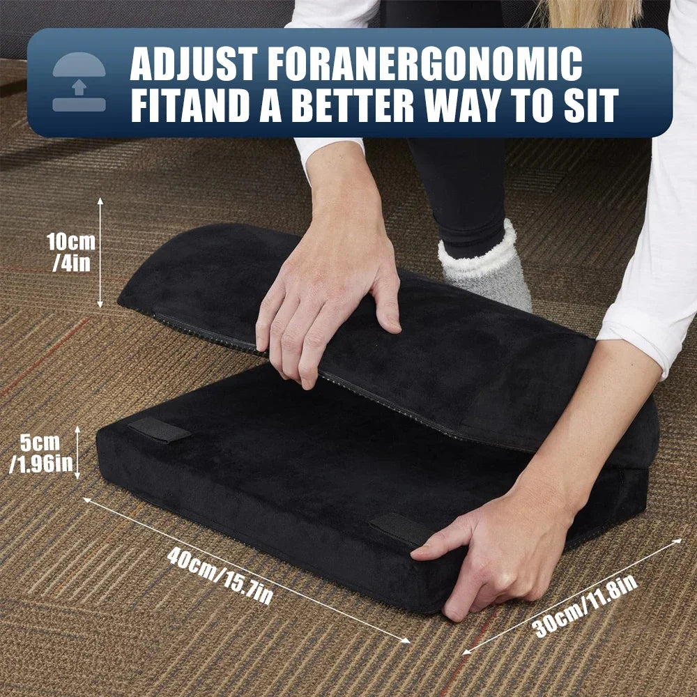 Adjustable black ergonomic under-desk footrest for office work, showing stackable design to relieve back and leg pain.