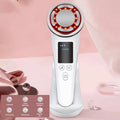 White hot and cold pulse facial beauty device with LED light therapy, EMS, vibration, and base for skin care.
