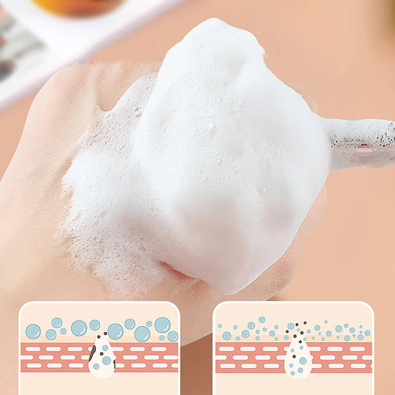 Soft facial cleansing brush creating rich foam for deep pore cleaning and gentle skin exfoliation.
