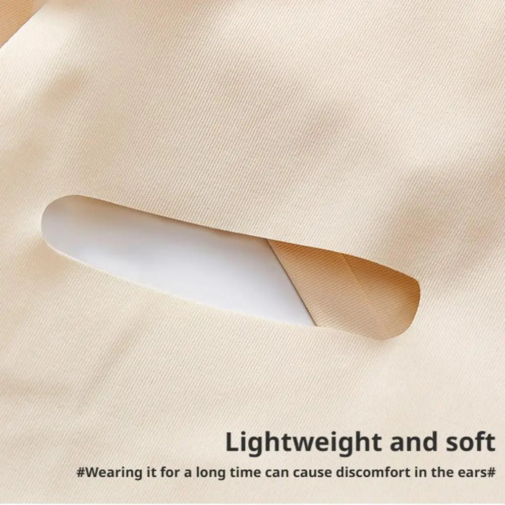 Close-up of a beige, soft, elastic fabric V-face shaper belt featuring a horizontal cutout for the ear.