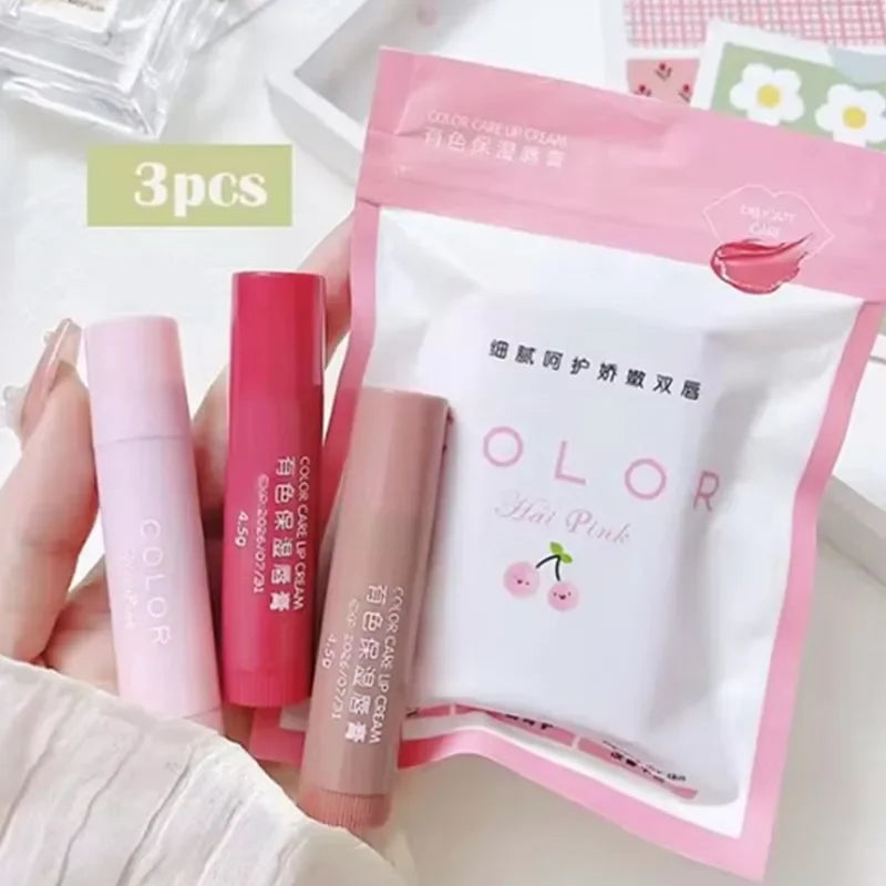 Three moisturizing lip balms in pink, red, and nude shades with a cute Korean-style cosmetic storage pouch.
