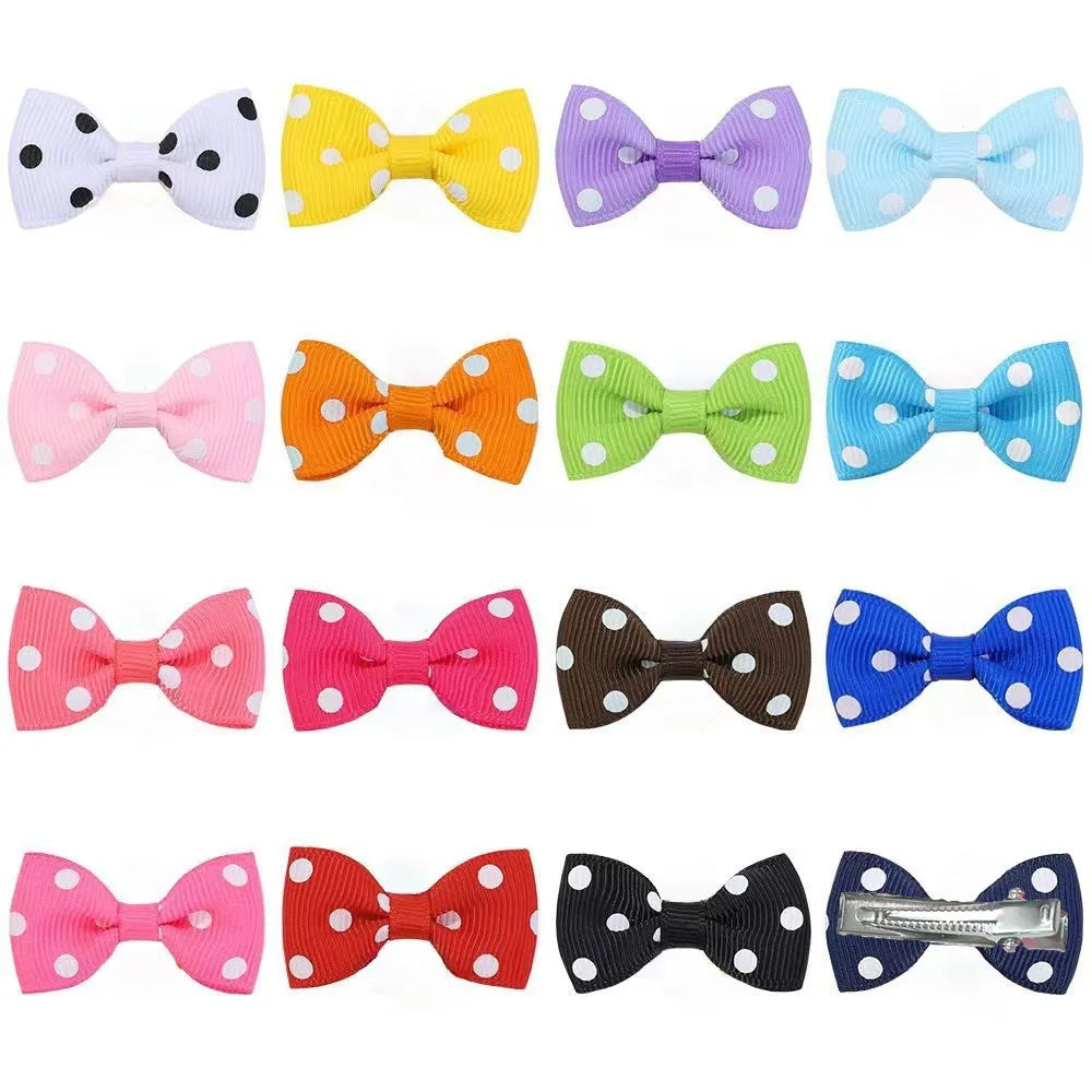 Colorful polka dot bow hair clips for small dogs and cats, perfect for pet grooming and cute styling.
