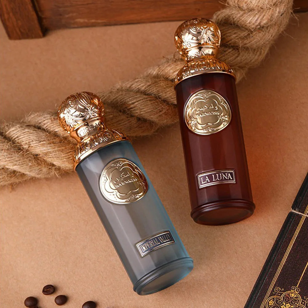 Lauren Emperor Valley unisex EDP, 100ml luxury Middle Eastern oud perfume in ornate gold-capped cylindrical bottles.