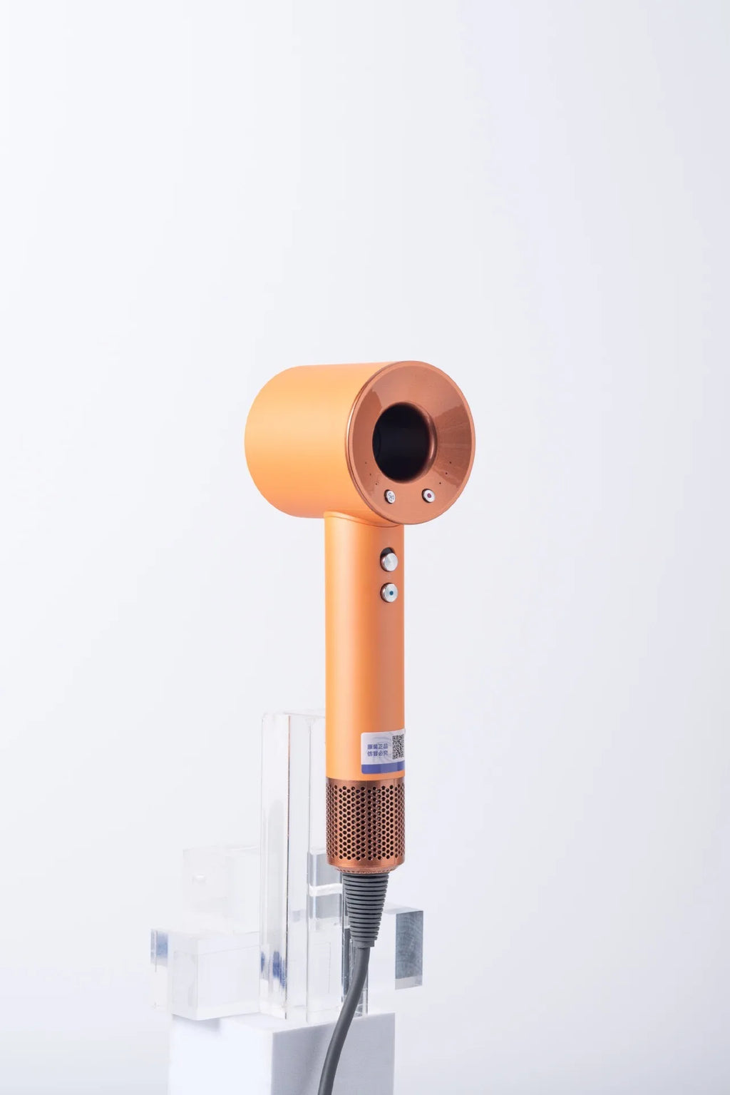 Orange high-speed negative ion bladeless hair dryer with magnetic attachments and ergonomic hollow design.