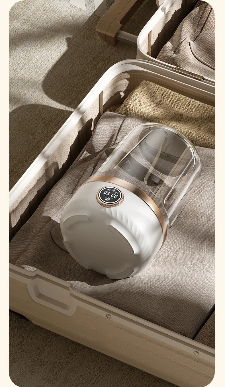 Tidesmit Mi 2L wireless portable washing machine with laundry cup for baby clothes, side view of compact mini washer
