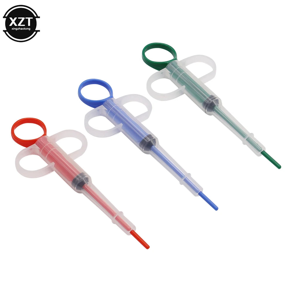 Colorful plastic pet pill dispensers for easy medicine and liquid feeding for cats and dogs.