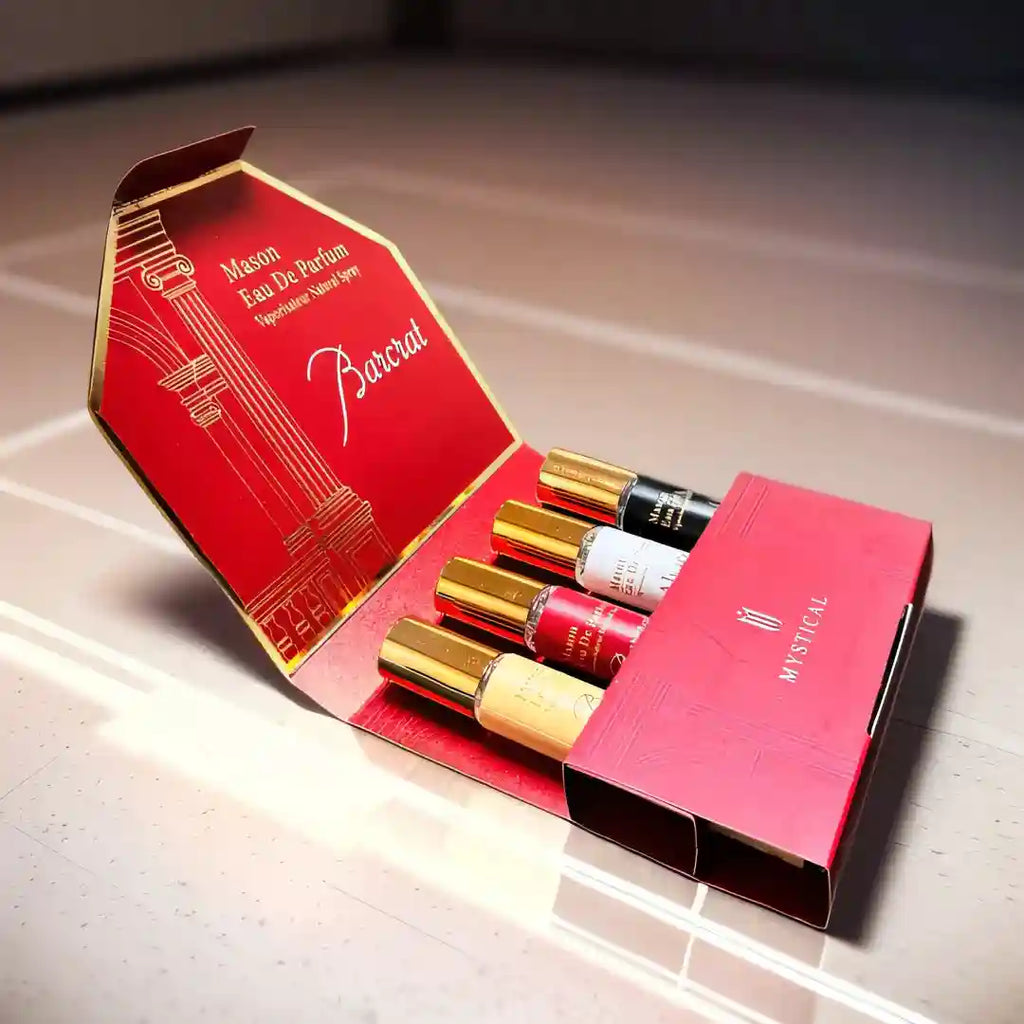 Mystical Barcrat unisex Eau de Parfum gift set: 4 travel-size glass spray bottles in a red luxury display box.