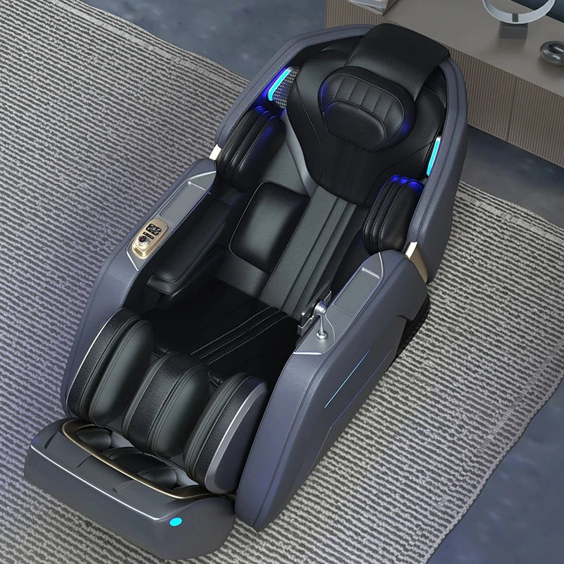 A modern, dark grey and black 4D massage chair with blue accent lighting, reclined on a textured grey area rug.