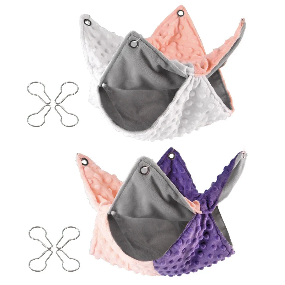 Warm, double-thick plush hanging hammocks for guinea pigs and squirrels in colorful contrast splicing designs.