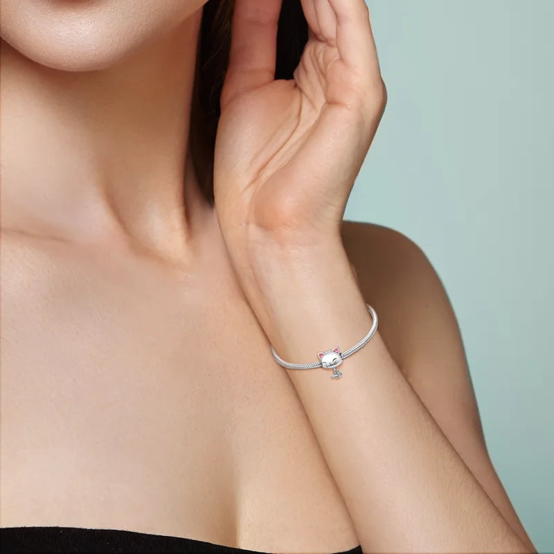 Cute 925 sterling silver cat charm pendant on bracelet for pet lovers—perfect DIY jewelry accessory.