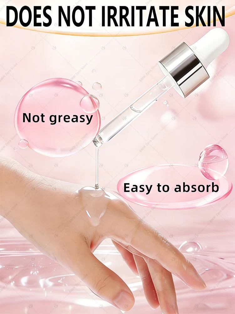 Clear serum being applied from a glass dropper onto a hand against a soft, pink-toned background.