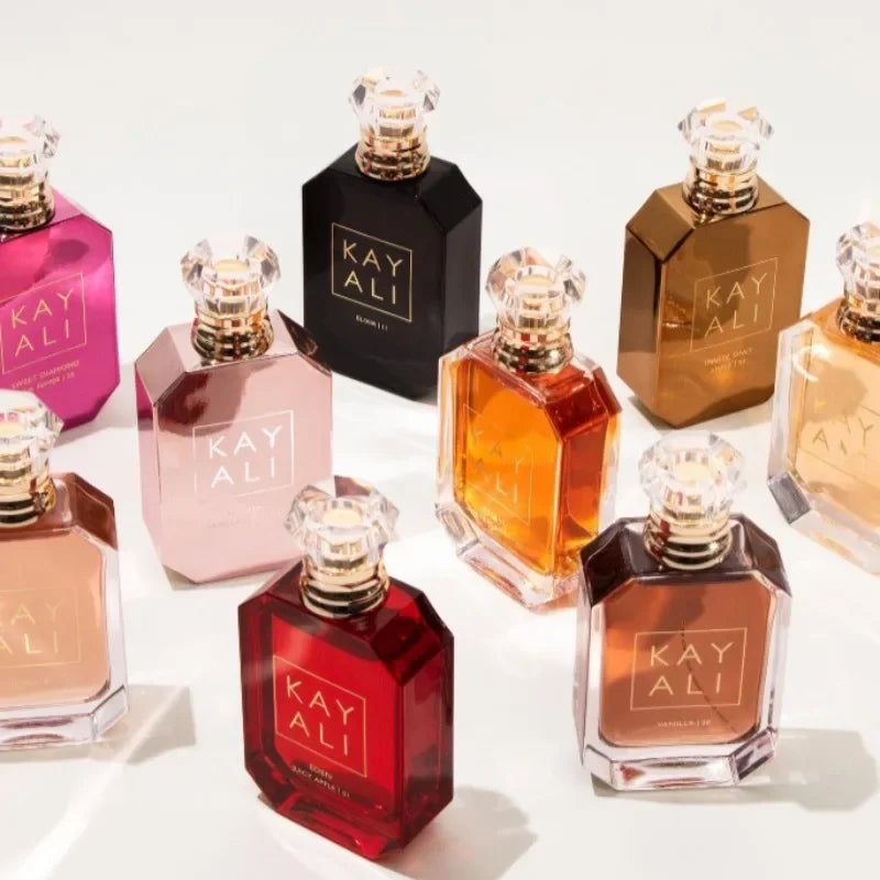 Kayali luxury EDP collection: long-lasting floral, fruity, woody, vanilla scent in iconic jewel-shaped perfume bottles.
